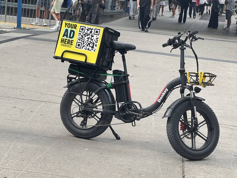 E-bike delivery bag with an advertising panel in downtown Toronto